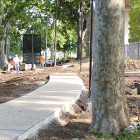 A construction site in a public green space. 