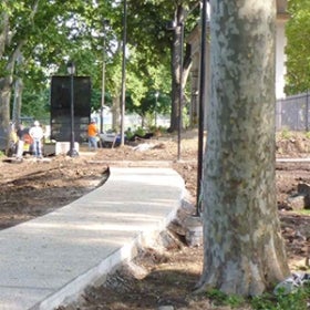 A construction site in a public green space.