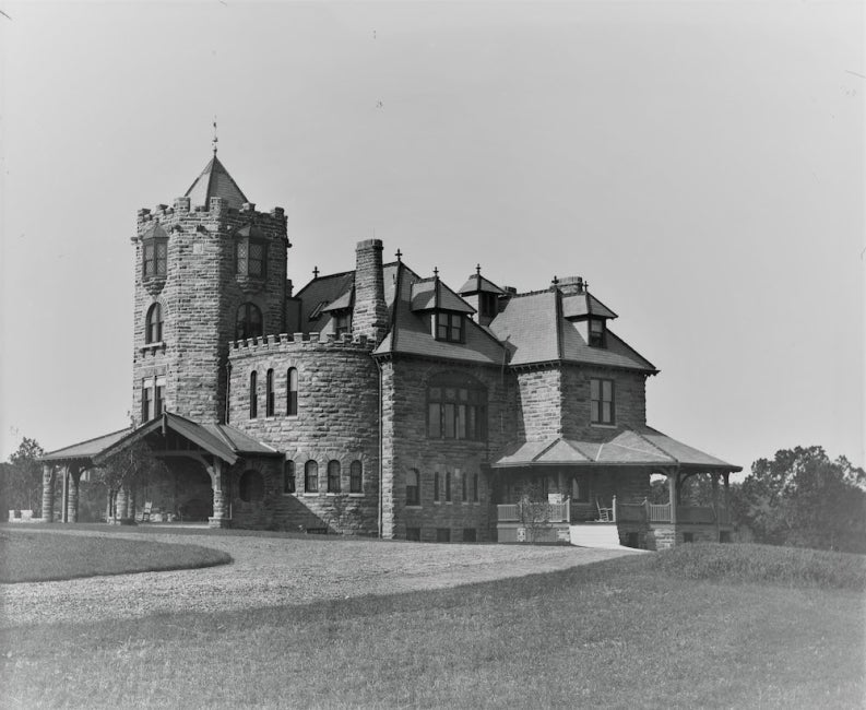 A black and white photo of a mansion circa 1888. 