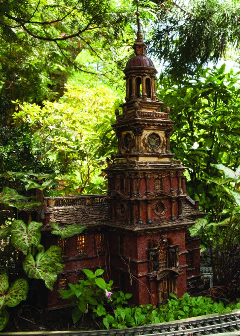 A miniature of Philadelphia's Independence Hall made of natural materials and set within a garden. 
