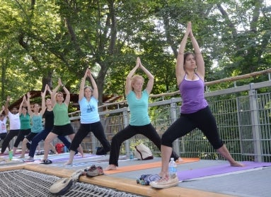 An outdoor yoga class. 