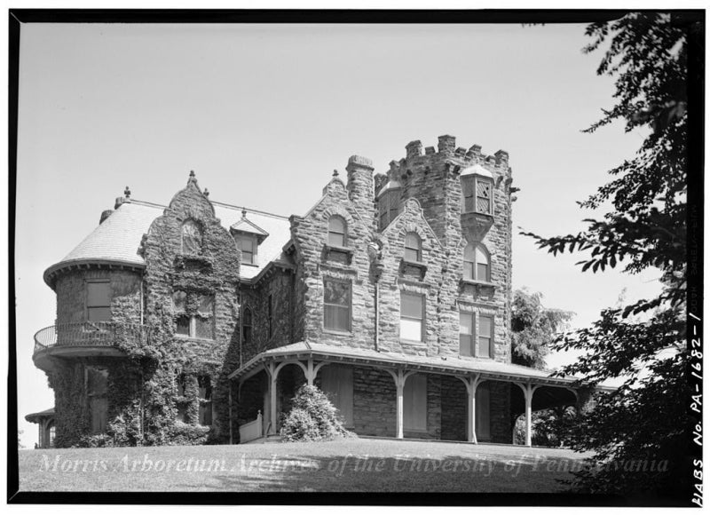A black and white photograph of a mansion in 1964