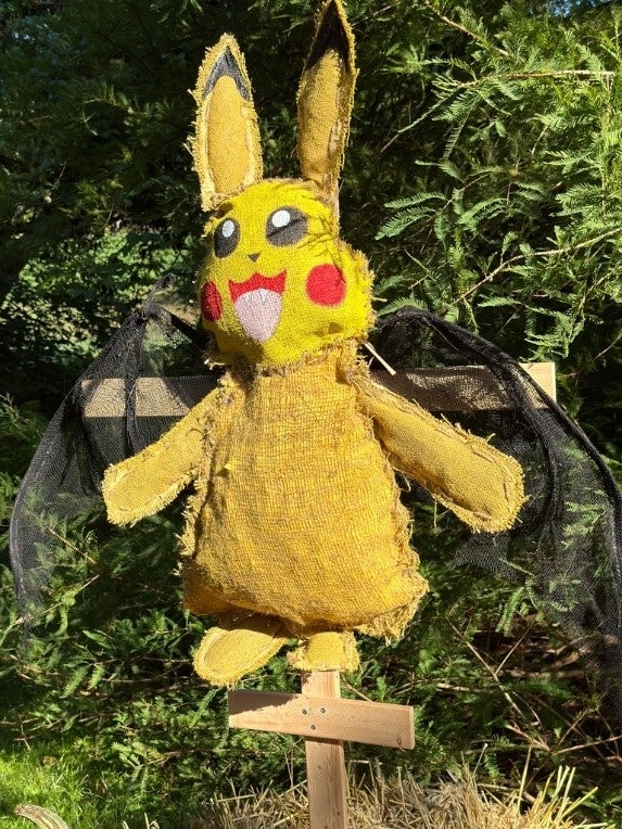 A scarecrow made to look like Pikachu.