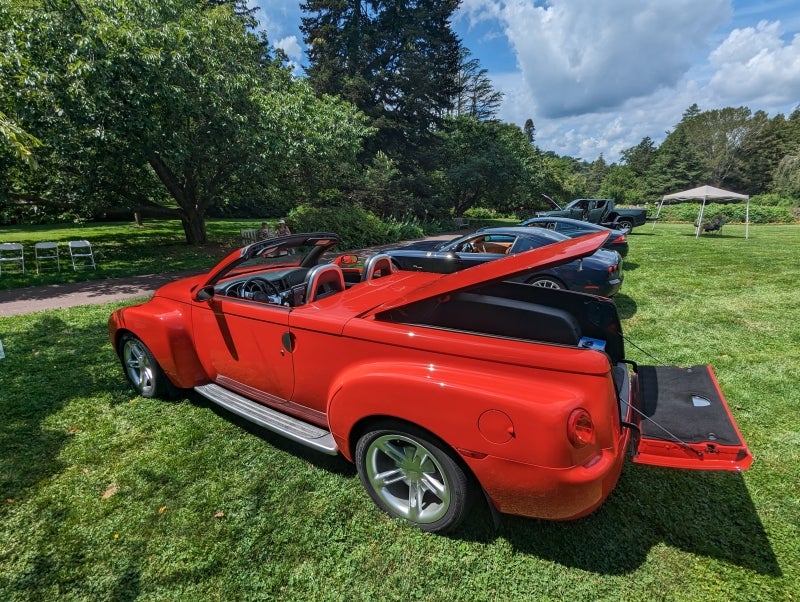 Back view of red 2002 Chevrolet SSR Convertible Pickup